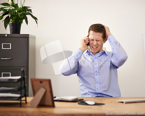 Image of Stress, phone call and businessman at desk with anger, bankruptcy and notification of unemployment. Anxiety, depression and burnout with smartphone, frustrated man in office and termination notice.