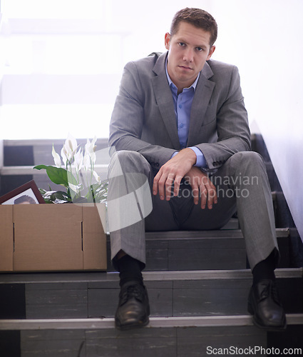 Image of Businessman, portrait or job loss in company with box, stairs or thinking of career crisis. Salesman, sad and face for mental health or anxiety for fired, worry and depression for termination of work