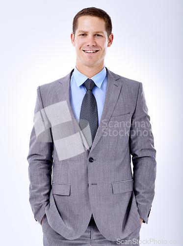 Image of Businessman, studio and happy portrait in formal suit for ambition, confident and commitment in recruitment. Smile, face and hr consultant with confidence in career and positive by white background