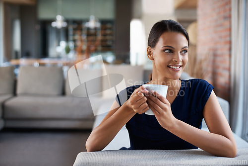 Image of Happy woman, thinking and drinking coffee in home on sofa to relax, peace or planning at breakfast in the morning. Dream, tea cup and person with idea for espresso, latte and smile in living room