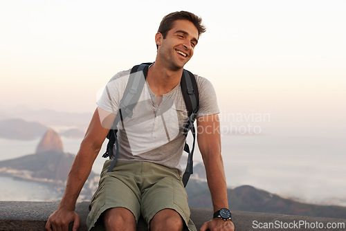 Image of Smile, travel and backpacking with man in Brazil as tourist for adventure, holiday or sightseeing. Destination, location and vacation in Rio de Janeiro with happy young person outdoor to explore