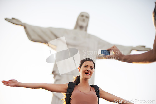 Image of Woman, photo and jesus statue for travel, backpacking and happy on journey on summer vacation. Art deco sculpture, peace or christ the redeemer in photography of lady or tourism destination in brazil