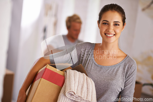 Image of Home, woman and happy with box for moving in with clothes, satisfied and property ownership. Portrait, people and packing furniture in new house with investment, real estate for growth and future.