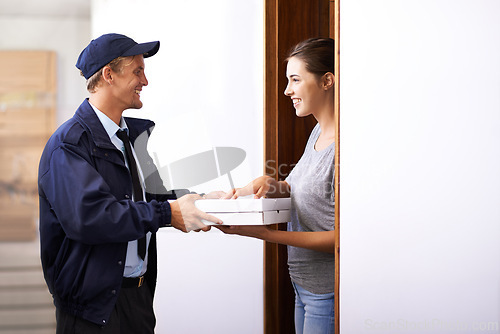 Image of Pizza, delivery and man with customer in home, giving a box and easy service to front door. Ecommerce, courier and happy woman with fast food, takeaway order and thank you for transport of package