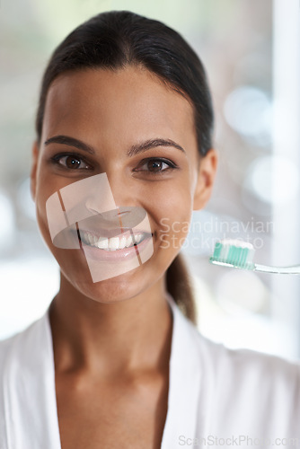 Image of Woman, dental and smile with toothbrush, self care and portrait for health in bathroom. Person, cleaning and healthcare for teeth, oral hygiene or routine at home with dentistry and whitening