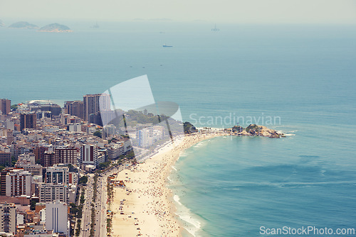 Image of Drone, water and beach for travel, summer and freedom, location and adventure in nature. Aerial view, ocean or Rio de Janeiro landscape, island or tropical paradise, relax or stress relief in Brazil