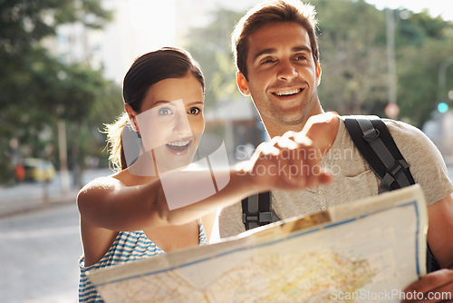 Image of Couple, pointing or map for tourist destination with direction, tour route and excited on holiday and vacation in Brazil. Face, man and woman with smile in city street for explore, tourism and travel