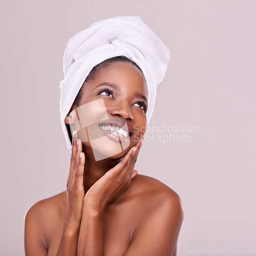 Image of Black woman, skin care and natural for beauty, studio and wellness in fresh look with smile and face touch. African female person, soft cosmetic and aloe vera for anti age, nude and confidence