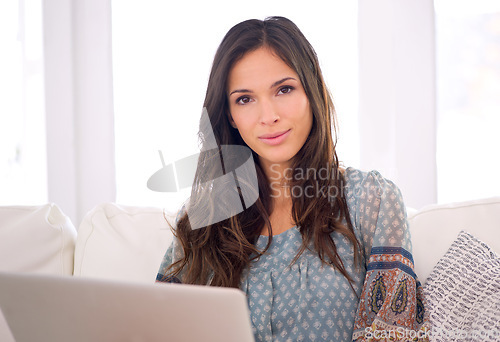 Image of Woman, laptop and portrait on sofa at home, living room and house for job hunting, applications and employment searching. Female person, graduate and computer browsing internet for vacancies