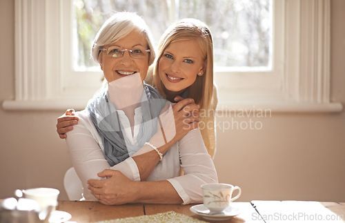 Image of Grandma, grandchild and happiness with hug in portrait at nursing home for visit and conversation with love. Mature woman, person and together for bonding or care, family and embrace with affection