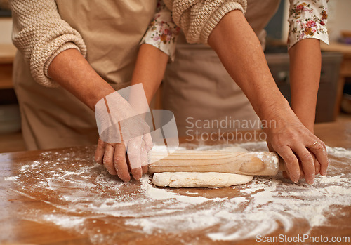 Image of Hands, help and flour for kneading dough made with love for baking, homemade pie and bonding while learning. Teaching, skills and support for rolling pastry for tart or dessert and handmade closeup.