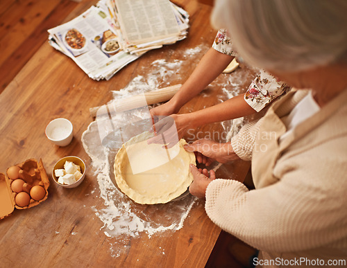 Image of Hands, baking and senior with recipes in kitchen for dessert and cookies with flour for cake. Grandma, retirement and eggs with butter for startup business as entrepreneur in house for food