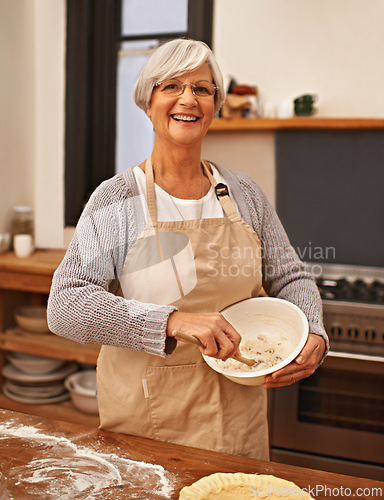 Image of Portrait, woman and senior baking with smile in kitchen for dessert and cookies with flour for cake. Grandma, happiness and retirement with joy for Easter festive in house for food and snacks
