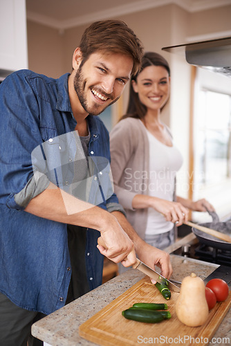 Image of Happy couple, portrait or cooking with vegetables in kitchen, love or bonding together for lunch on weekend. Man, woman or help with healthy food for salad for romantic dinner on cutting board