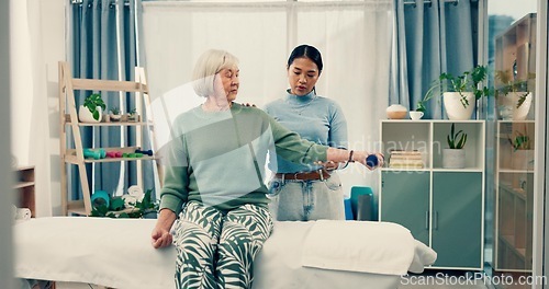 Image of Senior care, fitness and physiotherapist with old woman, dumbbell and healthcare for nursing. Physio, rehabilitation and retirement with training, caregiver with elderly patient for mobility exercise