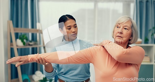 Image of Physiotherapy, stretching and senior woman in consultation for support, assessment and help with injury in office. Doctor, physiotherapist or nurse with an elderly patient for muscle or spine service