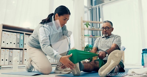 Image of Legs, stretching band or physiotherapist with old man, support or fitness for health or help. Physio, rehabilitation or retirement with training, caregiver with elderly patient for mobility exercise