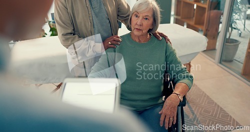 Image of Wheelchair, doctor and tablet for old woman in a physiotherapy consultation for advice. Support, couple talking or elderly patient with a disability, support and physiotherapist for results in clinic