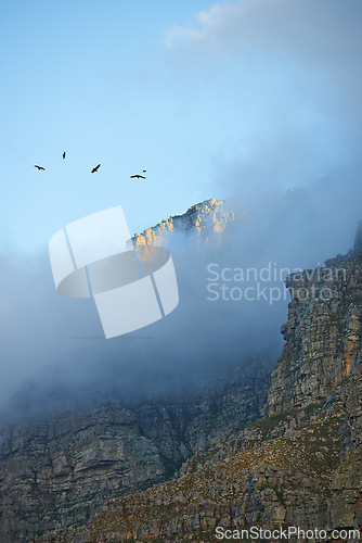 Image of Mountain, clouds and natural landscape with blue sky, scenery and peace for travel destination. Earth, nature and environment for outdoor adventure, explore and holiday location in Cape Town.