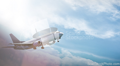 Image of Airplane, transportation and flight with sky for travel with journey, lens flare and flying in air for tourism. Drone view, commercial aircraft and aeroplane with departure, arrival and destination