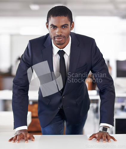 Image of Portrait, businessman and positive in office with ambition and assertive in corporate career in workplace. Happy face, black person and entrepreneur with planning and professional in startup company