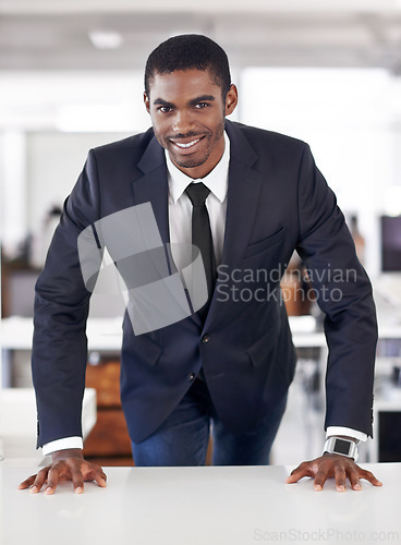 Image of Portrait, businessman and happy in office with ambition and assertive in corporate career in workplace. Positive face, black person and entrepreneur with planning and professional in startup company