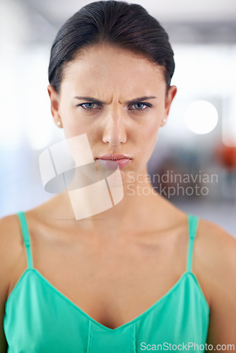 Image of Portrait, frown and angry with woman, stress and emotions with expression and frustrated. Face, person and girl with reaction and defensive body language with bad news or rage with feedback and emoji