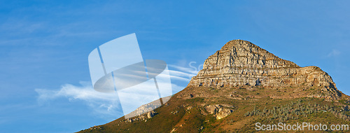 Image of Mountain, blue sky and peak with natural landscape for travel location, outdoor adventure and environment. Banner, nature and landmark for peace, explore and holiday destination in Cape Town.