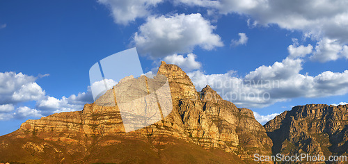 Image of Mountain, blue sky and sunset with natural landscape for travel location, outdoor adventure and environment. Banner, nature and clouds for peace, explore and holiday destination in Cape Town.