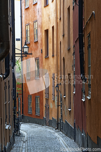 Image of Buildings, village and street with vintage house for beautiful architecture, heritage and culture for tourism in Rome. Ancient, road and travel in historic community or neighborhood for tourist.