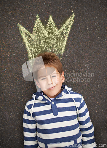 Image of Chalk art, portrait and boy with crown on floor for drawing, imagine or future fantasy on black background. King, face or boy with sketch of royalty, prince or dream for school, project or assignment