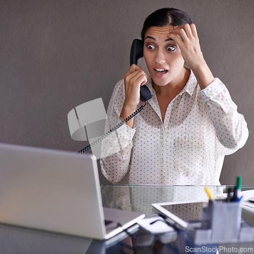 Image of Confused, woman and phone call in office for conversation on work, communication and uncertain for small business. Female person, talking and discussion on startup company with laptop for research.