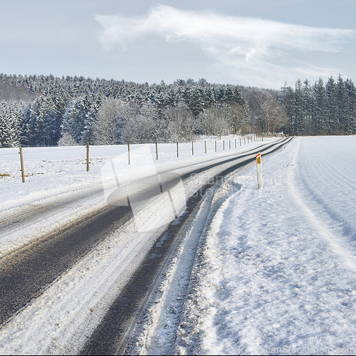 Image of Snow, road or nature with countryside travel, holiday and vacation scenery in Denmark or forest. Background, sky or street for journey, tourism or outdoor adventure with woods, trees or winter season