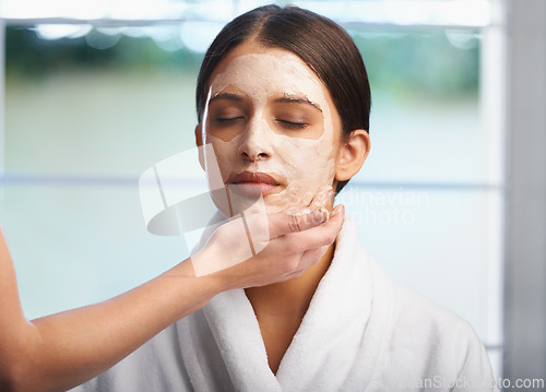 Image of Hand, skincare and women at home with face mask or diy spa treatment at home together. Beauty, wellness and friends with facial product for skin, cleaning or bonding on weekend sleepover in a house