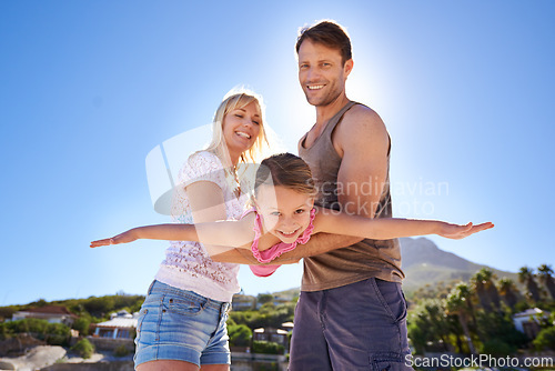 Image of Love, airplane and parents lifting child at a beach for travel, fun or bonding in nature together. Freedom, support and family at sea for morning games, playing or flying adventure in South Africa