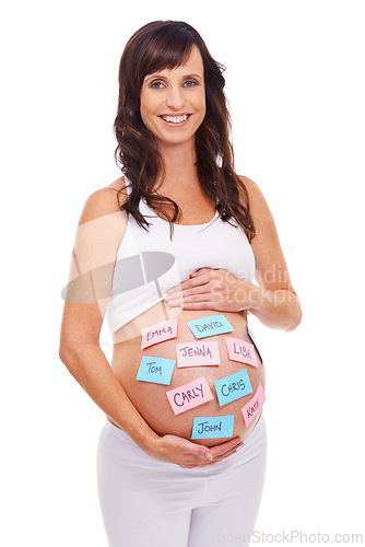 Image of Portrait, names and sticky notes on stomach of pregnant woman with baby in studio isolated on white background. Smile, choice or decision and happy prenatal mother with idea on belly for maternity