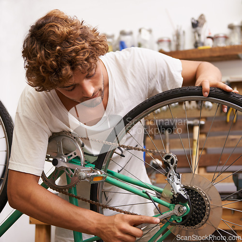 Image of Handyman, fixing and bicycles with with tools at workshop for repair, maintenance with small business. Mechanic, Entrepreneur and garage as expert for bike with equipment for service and upgrade