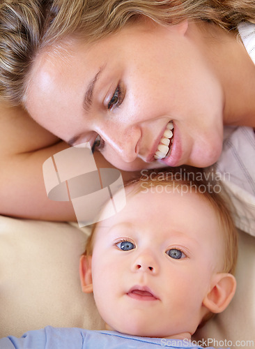 Image of Baby, cute and happy with mother, relaxing and love together with child and care for motherhood. Infant, mom and smile for affection, nurture and home for growth and babysitting with family bonding