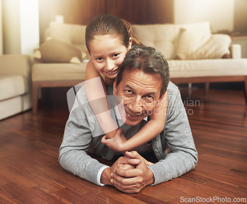 Image of Portrait, home and grandfather on the floor, girl and happiness with love and vacation. Face, apartment and elderly man with grandchild or bonding together with fun and playing with holiday and relax