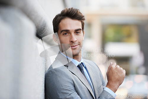 Image of Happy, confident and portrait of businessman in city with positive, good and proud attitude. Smile, suit and handsome professional male accountant with classy and elegant style in urban town.