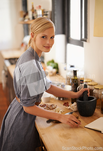 Image of Cooking, woman and ingredients with portrait in a home with diet, nutrition and healthy food with smile. Kitchen, bowl and happy from organic and vegan lunch with mushroom and board with wellness