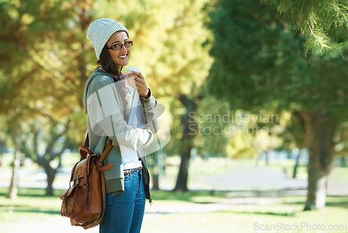 Image of Portrait, education and woman student in park with books for university or college study and scholarship. Smile, summer and happy young pupil on school campus for learning, growth and development