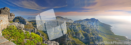 Image of Mountains, nature and ocean with sky for travel, hiking and eco friendly tourism with banner of Cape Town. Aerial view of environment, landscape and sea on the horizon with adventure in South Africa