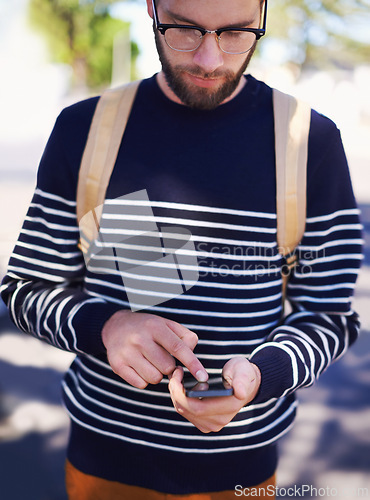 Image of College, phone and man in outdoors for website, student and scrolling on university app or internet. Town, male person and typing a message or check email, online and communication or education