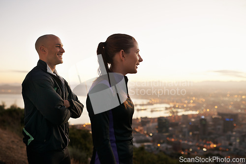 Image of Happy couple, fitness and vision with city on mountain for dream, ambition or outdoor workout in nature. Young man and woman with smile for view of town in exercise or training together on cliff