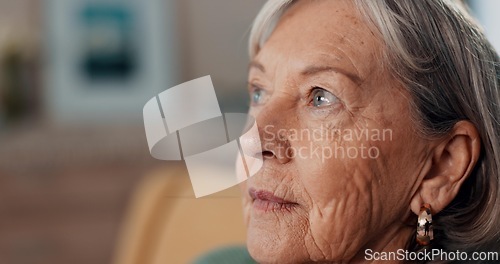Image of Thinking, depression and regret by old woman, home and retirement while feeling lonely. Remember, mental health and nostalgia by senior female person in closeup, mourning and alone with memories