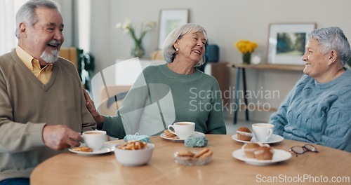 Image of Discussion, coffee and senior friends in living room of nursing home for communication. Smile, conversation and group of elderly people in retirement talking, bonding and drinking cappuccino at house