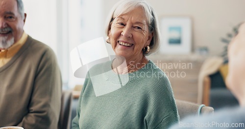 Image of Home, happy friends and senior woman relax, conversation and bonding in lounge. Elderly, pensioner and group of people smile in living room for chat, funny and laughing together in retirement house