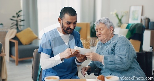 Image of Nursing home, photo album and caregiver with old woman in retirement, break and bonding together. Love, memory or senior person with pictures for support or nostalgia with care, nurse or conversation