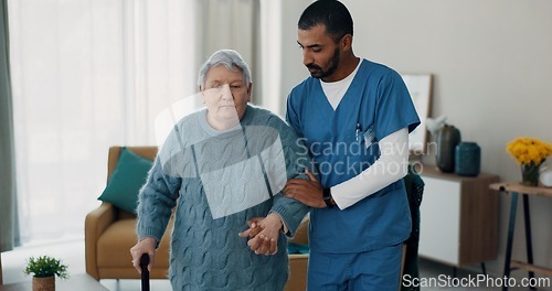 Image of Senior woman, nurse and walking stick for support at nursing home in retirement. Elderly female patient with disability and caregiver man for rehabilitation, healthcare and help for healing injury